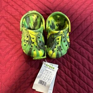 CROCS Kids' Yellow and Green Camo Sandals baby